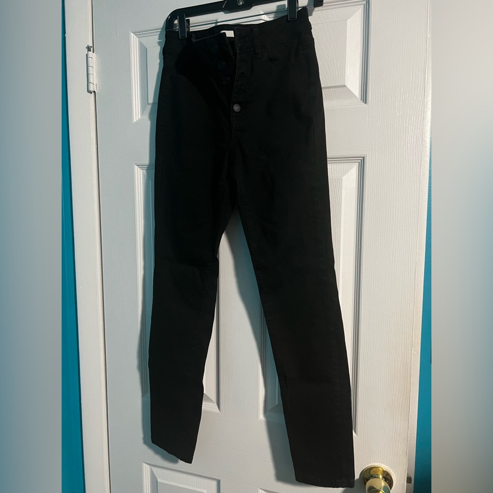 I am selling high rise skinny jeans. size 5/27W.